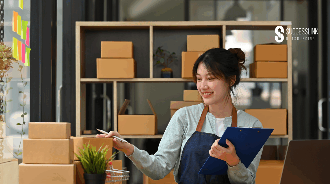Confident small business owner packing increasing orders, symbolizing how outsourcing drives efficiency and accelerates business growth.